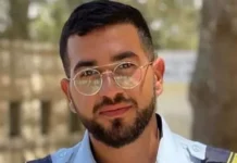 बंधक फौजी के शव को कब्रिस्तान से निकाला गया